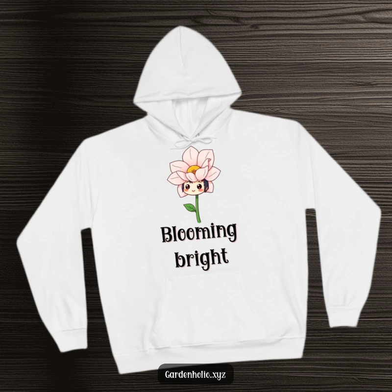 Funny hoodie depicting a character with a cheerful expression admiring a magnificent, oversized flower that just bloomed.