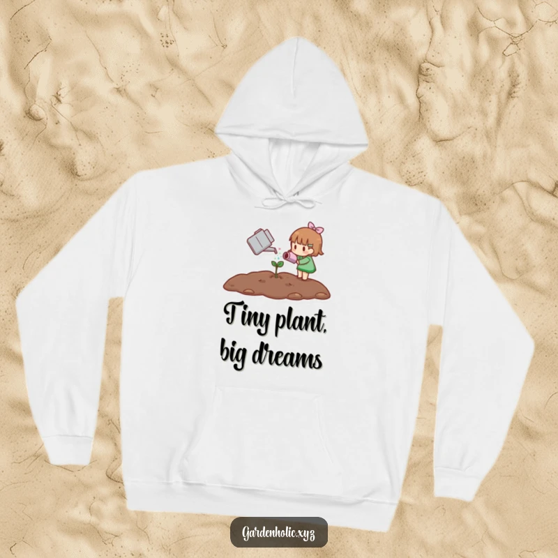 Funny hoodie depicting a small character dedicated to watering a tiny sprout, offering warmth and a whimsical gardening theme.