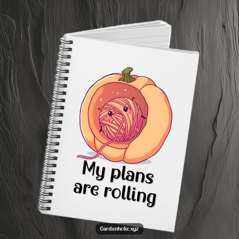 Funny yarn pumpkin notebook with a cheerful, fuzzy ball of yarn rolling downhill inside a giant pumpkin, perfect for creative notes.