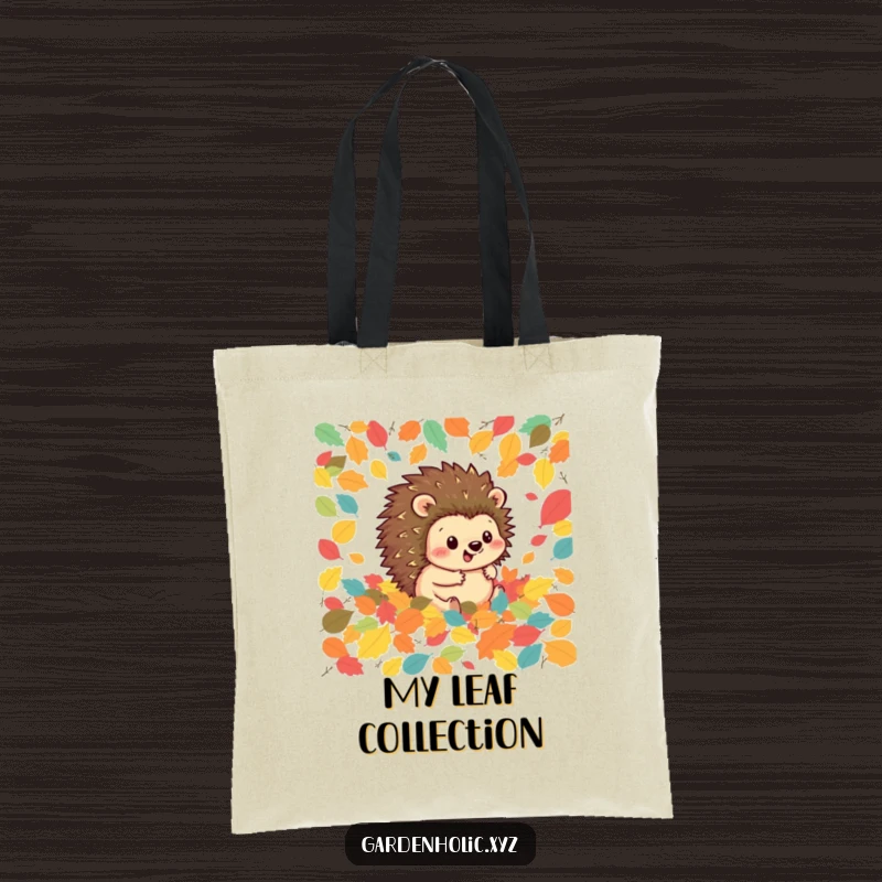 Funny hedgehog tote bag depicting a happy hedgehog rolling through a pile of colorful leaves, symbolizing the joy of autumn.